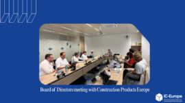 Board of Directors meeting with Construction Products Europe, executives seated around a long conference table in a bright office.