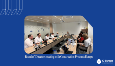 Board of Directors meeting with Construction Products Europe, executives seated around a long conference table in a bright office.